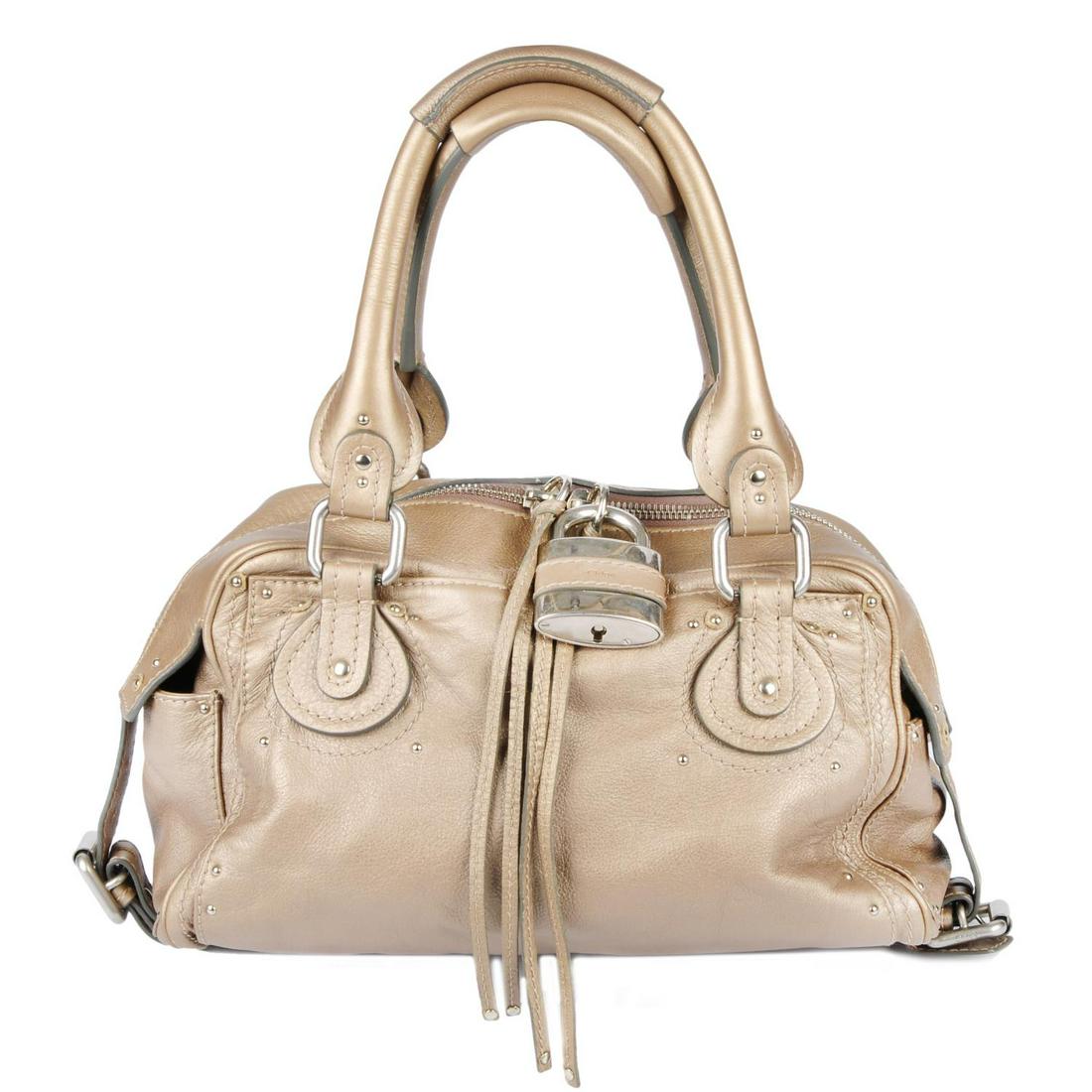 CHLOÉ - a bronze leather Paddington top handle handbag.: CHLOÉ - a bronze leather Paddington top handle handbag. Featuring a pebbled metallic, bronze leather exterior, dual rolled leather top handles, brushed gold-tone hardware, maker's oversized signature