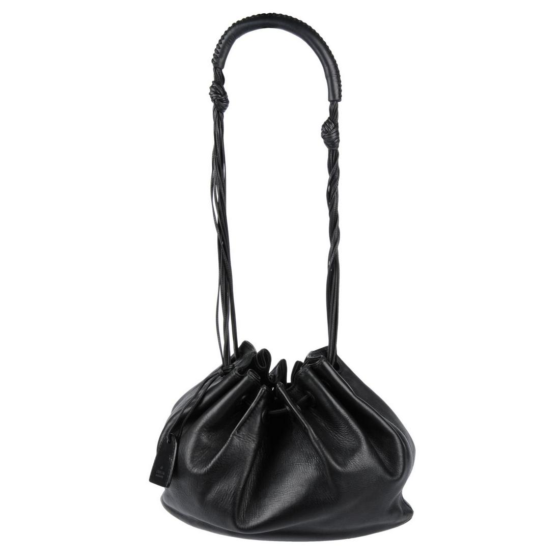 GUCCI - a black leather drawstring handbag. Featuring a (1 of 4)