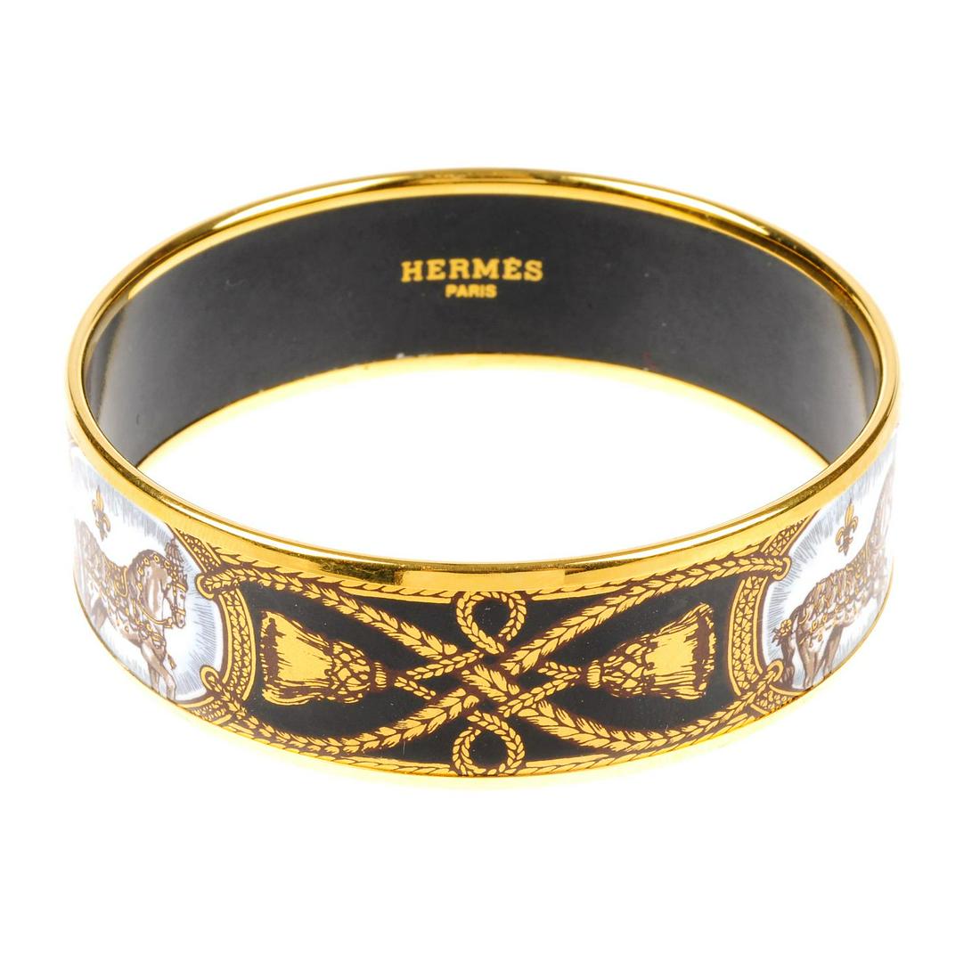 HERMÈS - an enamel bangle. The gold-tone edge with (1 of 3)