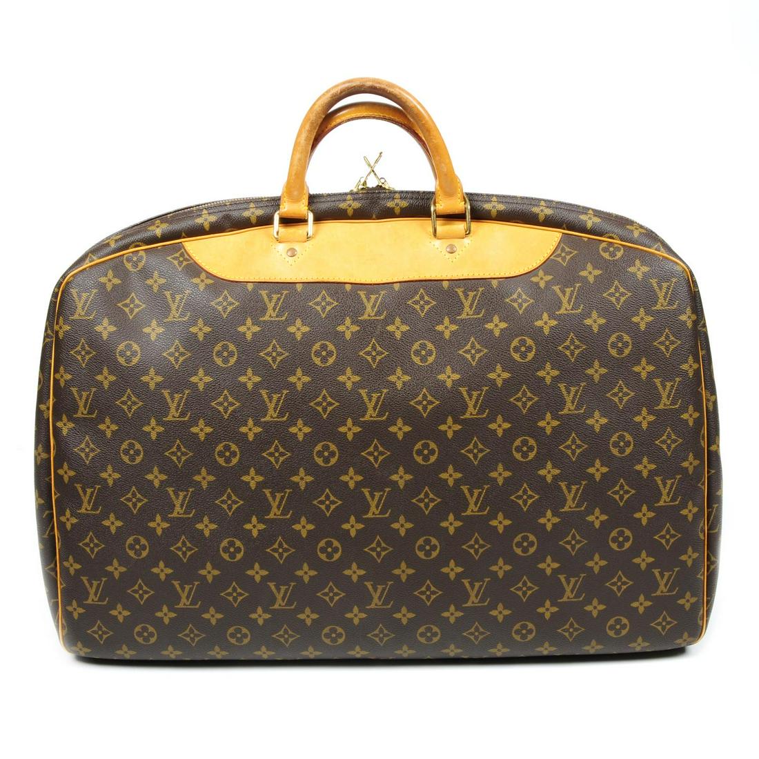 LOUIS VUITTON - a Monogram Alizé travel bag. Designed (1 of 6)