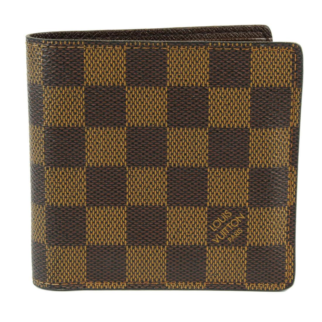 LOUIS VUITTON - a Damier Ebene Bifold wallet. Designed (1 of 3)