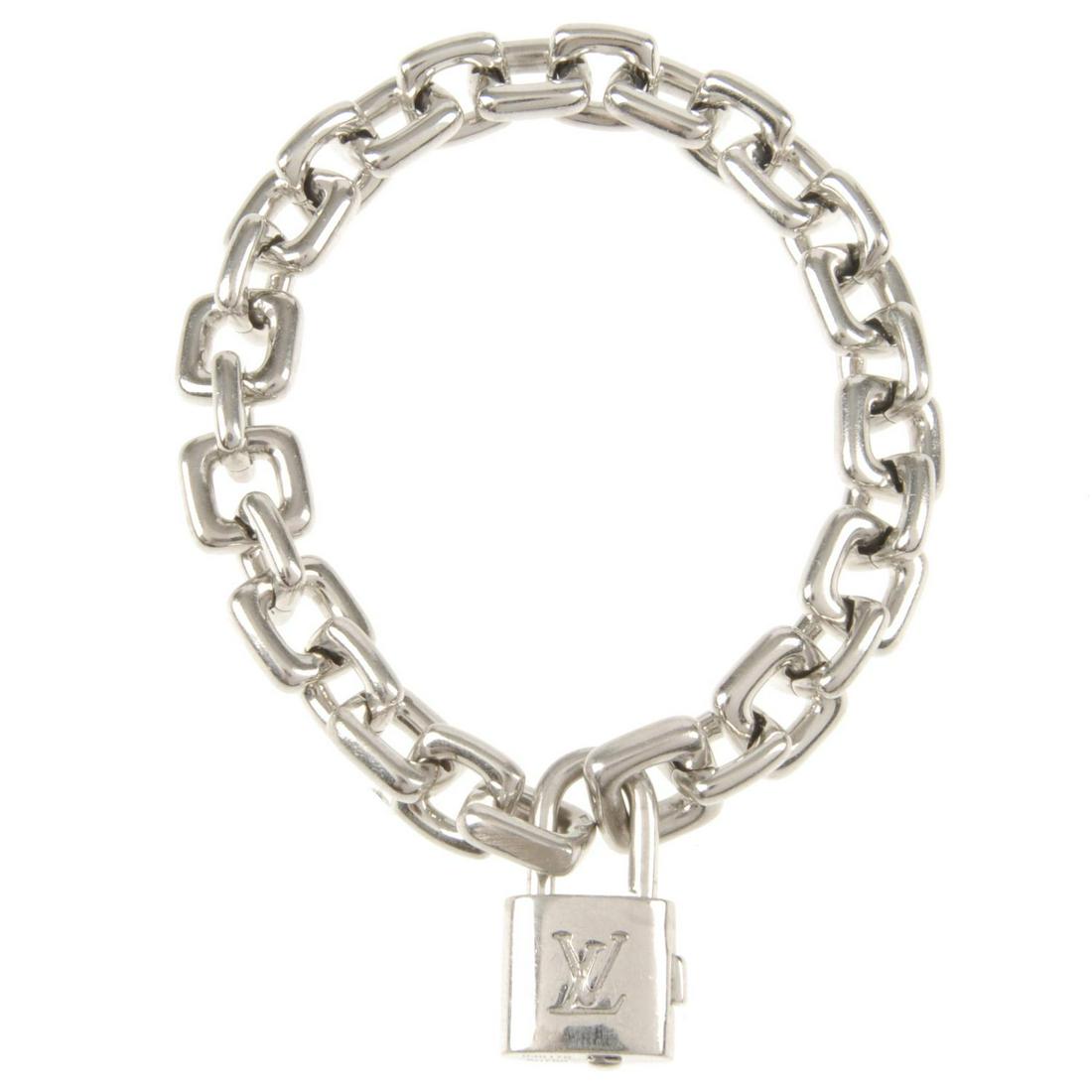 LOUIS VUITTON - an 18ct white gold link bracelet. (1 of 2)