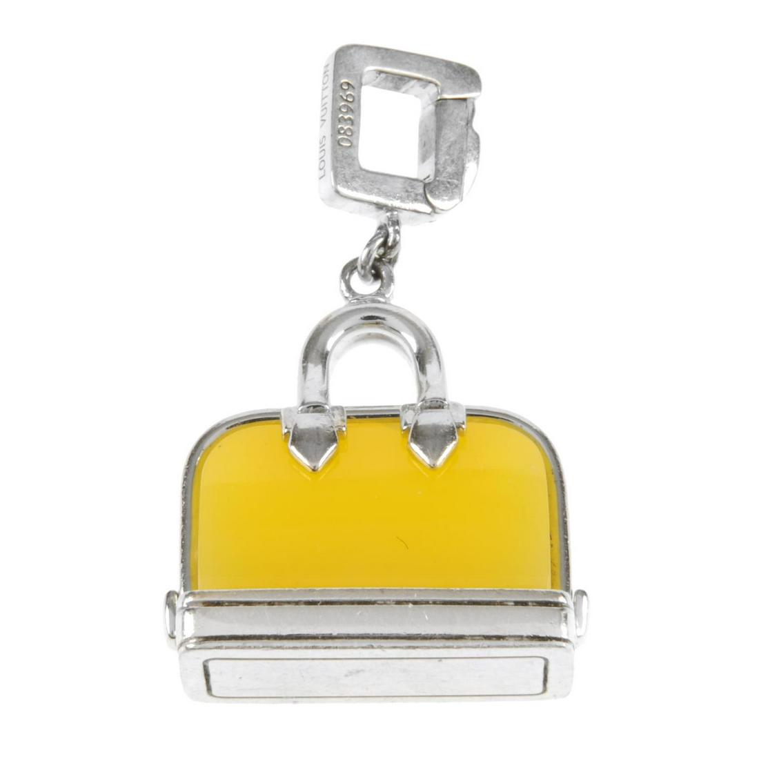 LOUIS VUITTON - an 18ct white gold handbag charm. (1 of 2)