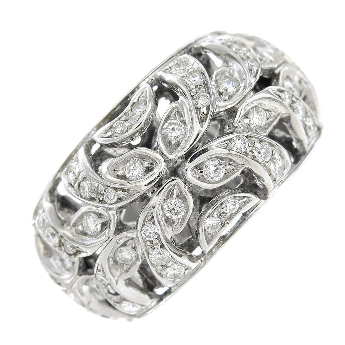 An 18ct gold diamond foliate dress ring, by Chimento.: An 18ct gold diamond foliate dress ring, by Chimento. One diamond deficient.Signed Chimento.Estimated total diamond weight 0.80ct.Hallmarks for London.Ring size N. 13.7gms.