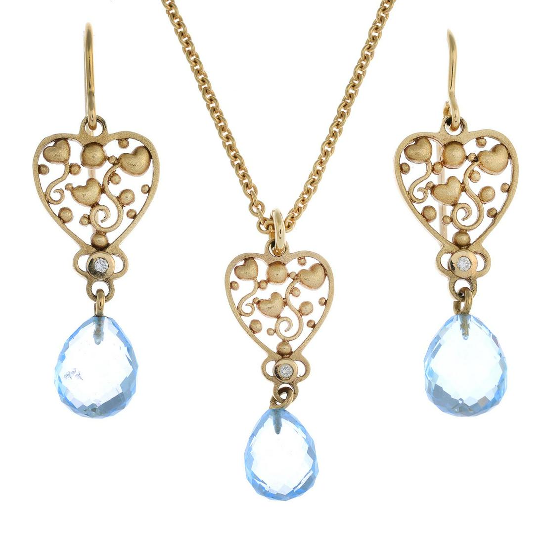 An aquamarine and diamond set, by Ole: An aquamarine and diamond set, by Ole Lynggaard.Aquamarine to pendant AF.Stamped 585, chain stamped 750.Length of pendant 3.2cms. Length of earrings 4cms. Length of chain 42cms. 13.8gms.