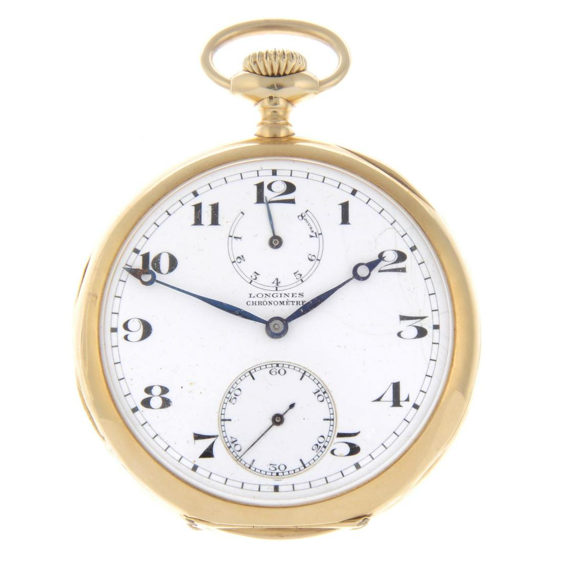 An open face eight day chronometer pocket watch by: An open face eight day chronometer pocket watch by Longines. Yellow metal case, stamped 18k with poincon. Numbered 2973607. Signed keyless wind eight day nineteen jewel calibre 19.41 with club tooth l