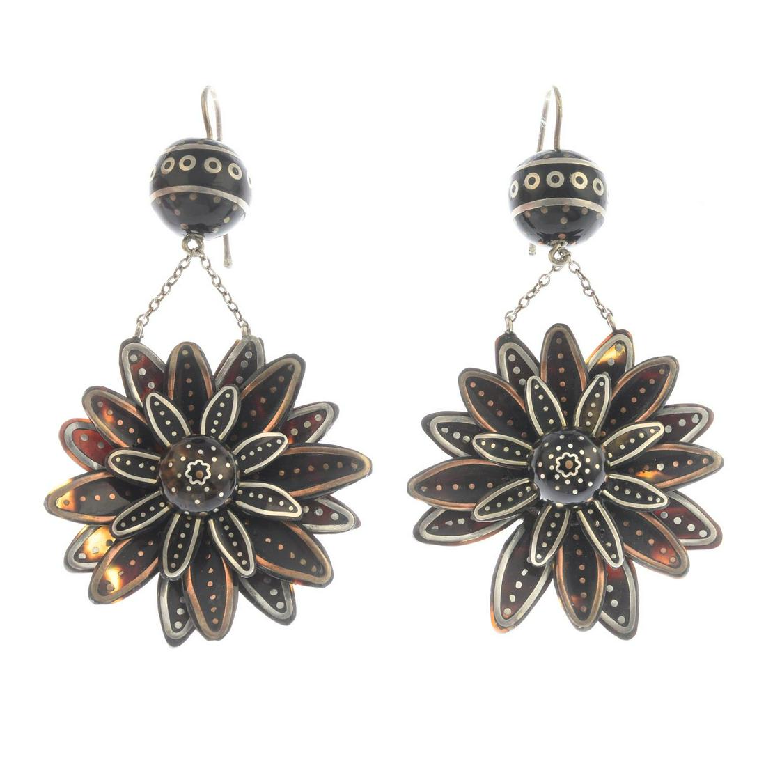 A pair of tortoiseshell earrings. Length 7.3cms. Total (1 of 2)