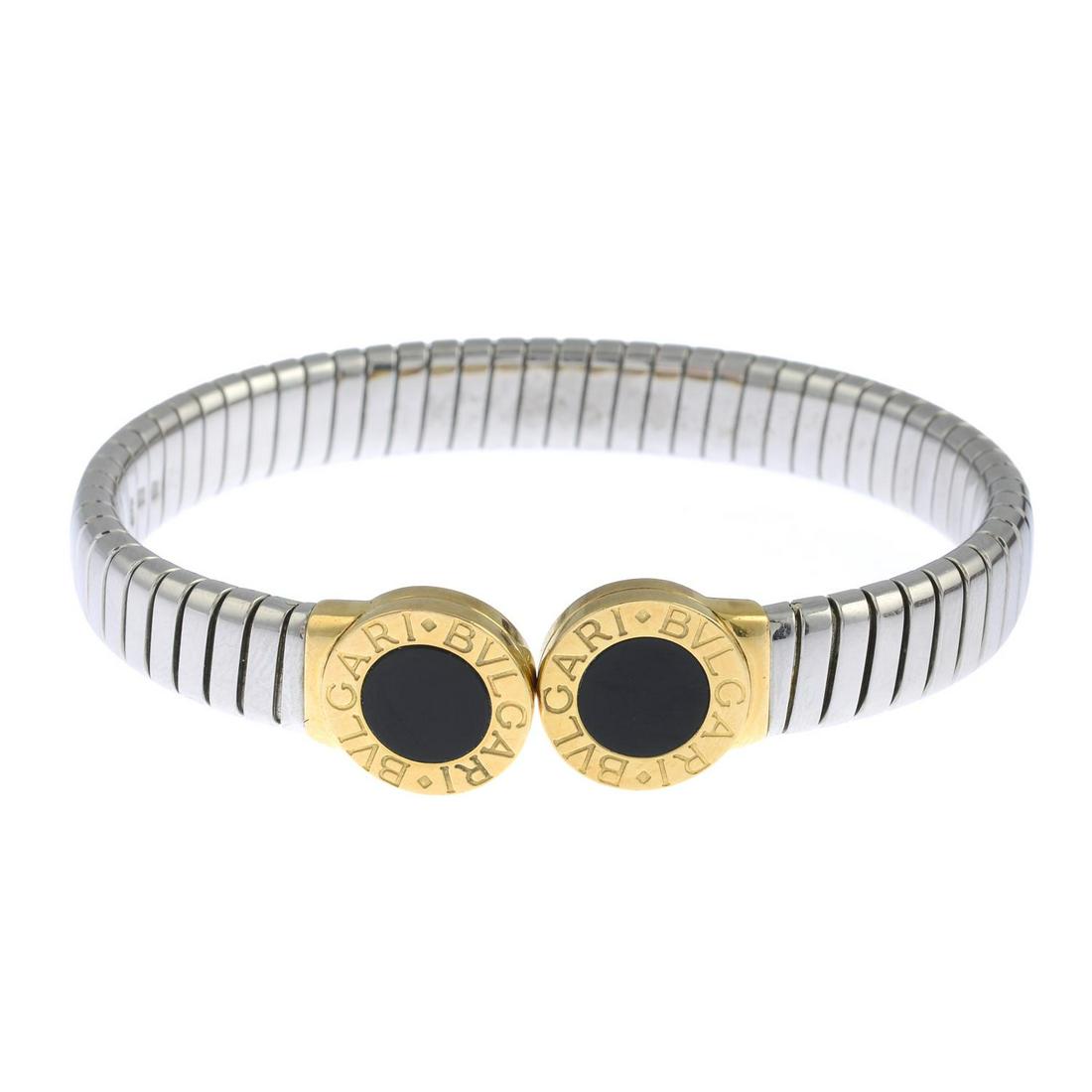 A 'Bulgari Bulgari' bangle with onyx terminals, by (1 of 3)