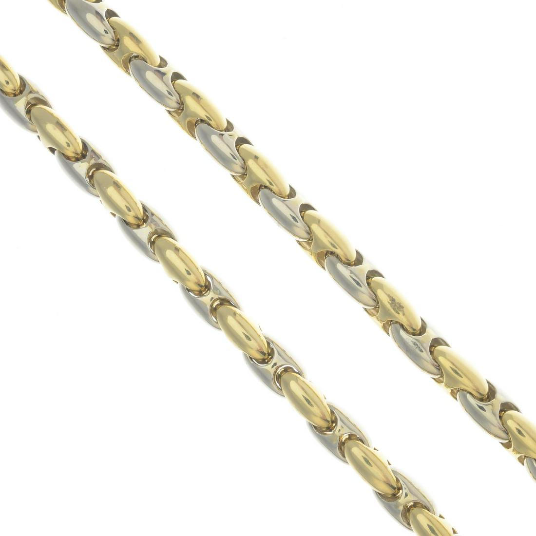 An 18ct gold bi-colour fancy-link necklace, by: An 18ct gold bi-colour fancy-link necklace, by Chimento.Signed Chimento.Italian marks.Hallmarks for Birmingham.Length 21cms. 41gms.