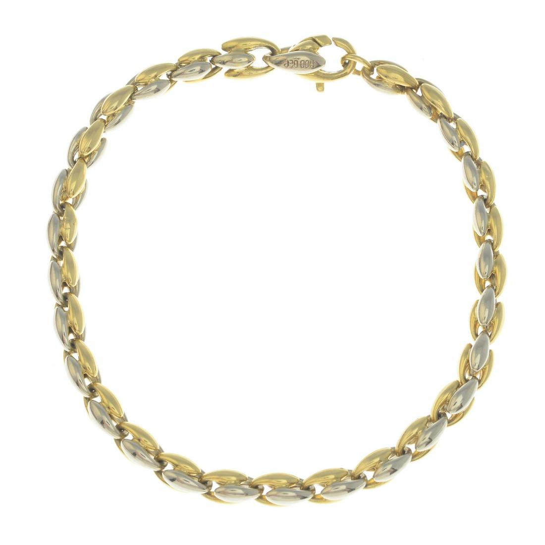 A fancy-link bi-colour bracelet, by Chimento.Signed: A fancy-link bi-colour bracelet, by Chimento.Signed Chimento.Stamped 750.Length 20cms. 13.2gms.