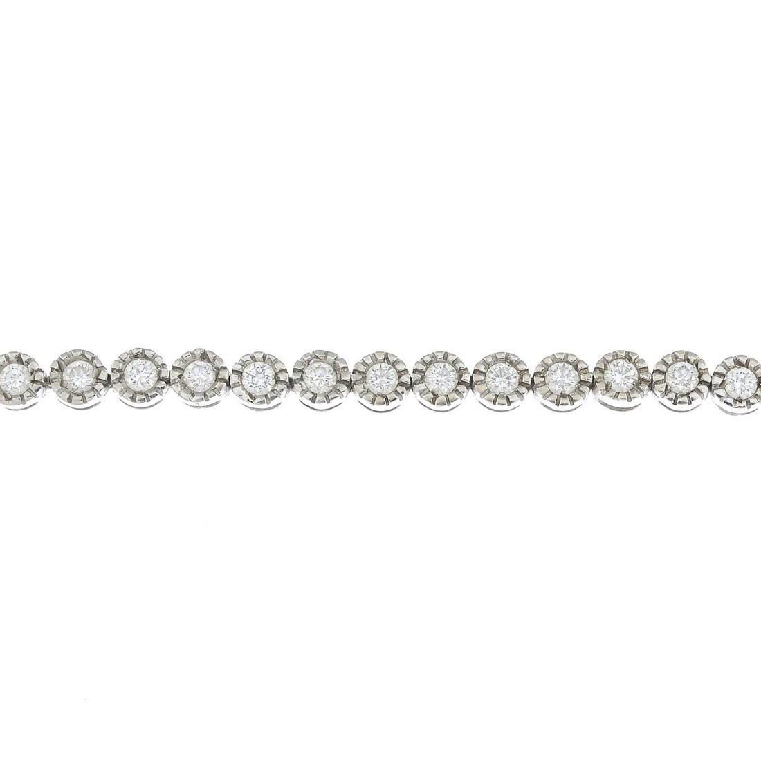 (23681) An 18ct gold diamond line bracelet.Estimated (1 of 3)