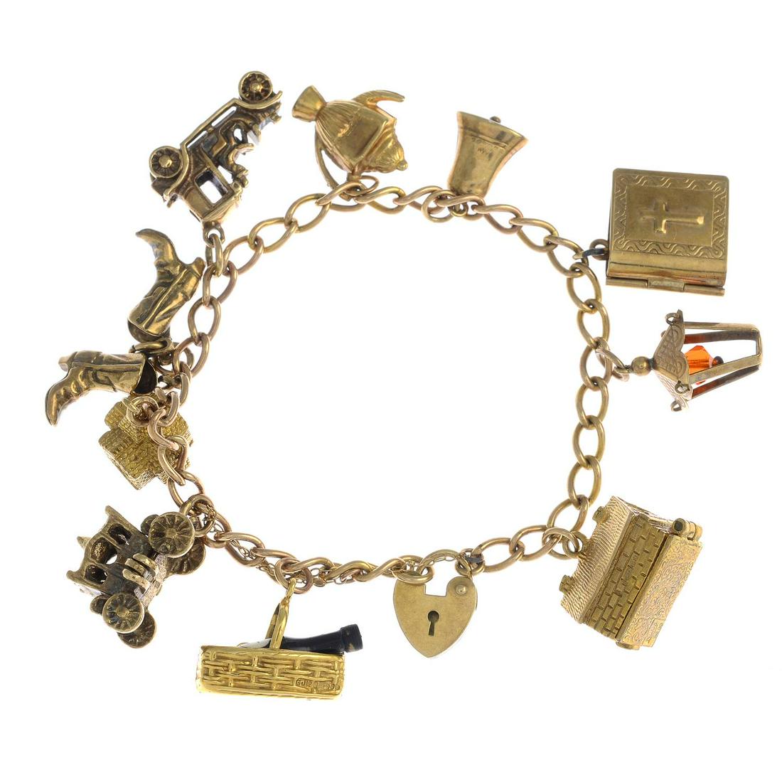 (23705) A 9ct gold charm bracelet, with ten 9ct gold (1 of 2)