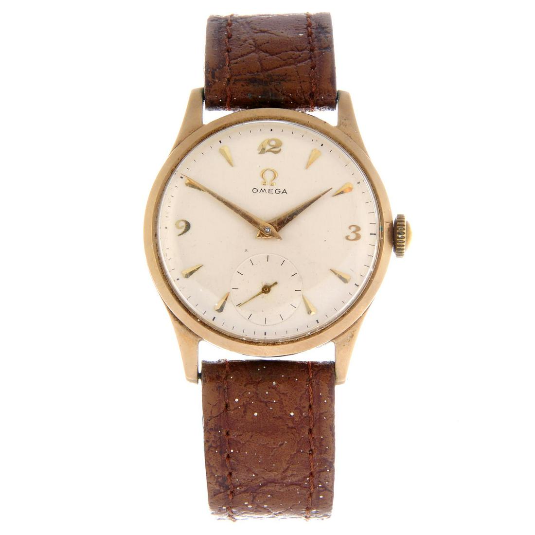 OMEGA - a gentleman's wrist watch. 9ct yellow gold (1 of 7)