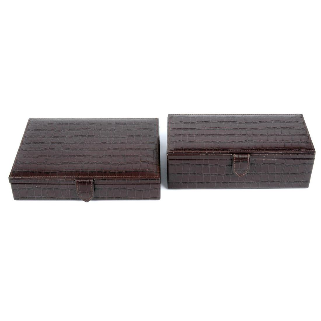MAPPIN & WEBB - a leather cufflink case and watch case.: MAPPIN & WEBB - a leather cufflink case and watch case. Both crafted from brown crocodile embossed leather, with compartmentalised interiors and black microfibre lining. Lengths measure 21 and 21.5cms