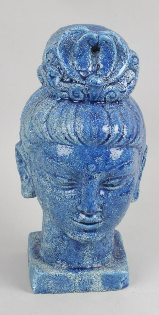 Aldo Londi for Bitossi, a 1960s blue glazed pottery: Aldo Londi for Bitossi, a 1960s blue glazed pottery bust modelled as head of Guan Yin, numbered to base 42/104 and marked Italy, 11.25 (28.5cm) high.