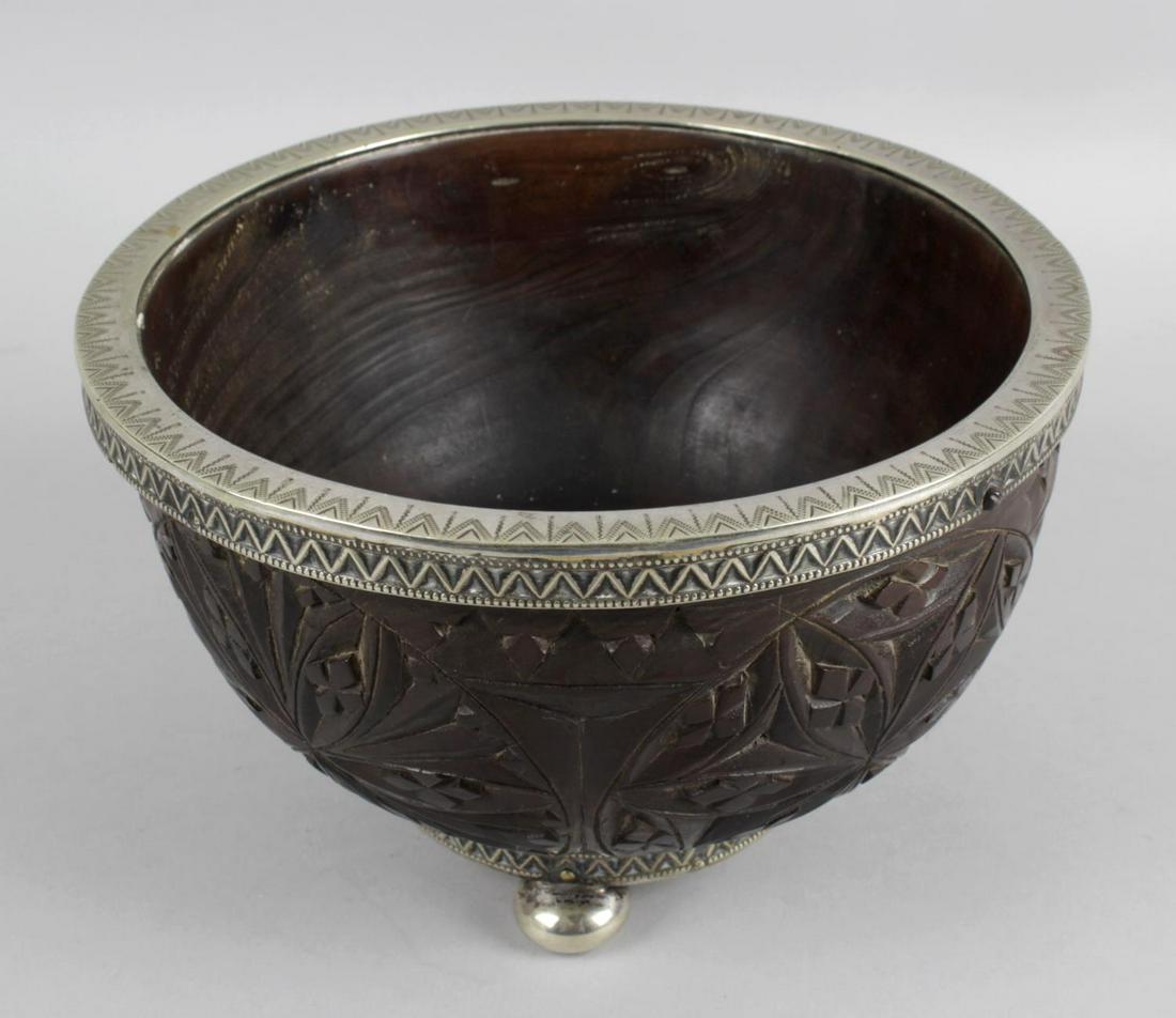 A 19th century Scottish provincial mazer style bowl,: A 19th century Scottish provincial mazer style bowl, the chip carved and stained oak bowl, impressed to interior, Burns, the timber originally from the Burns estate, within engraved plated mounts, imp