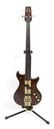 A Westone Thunder III bass guitar, the stained wooden