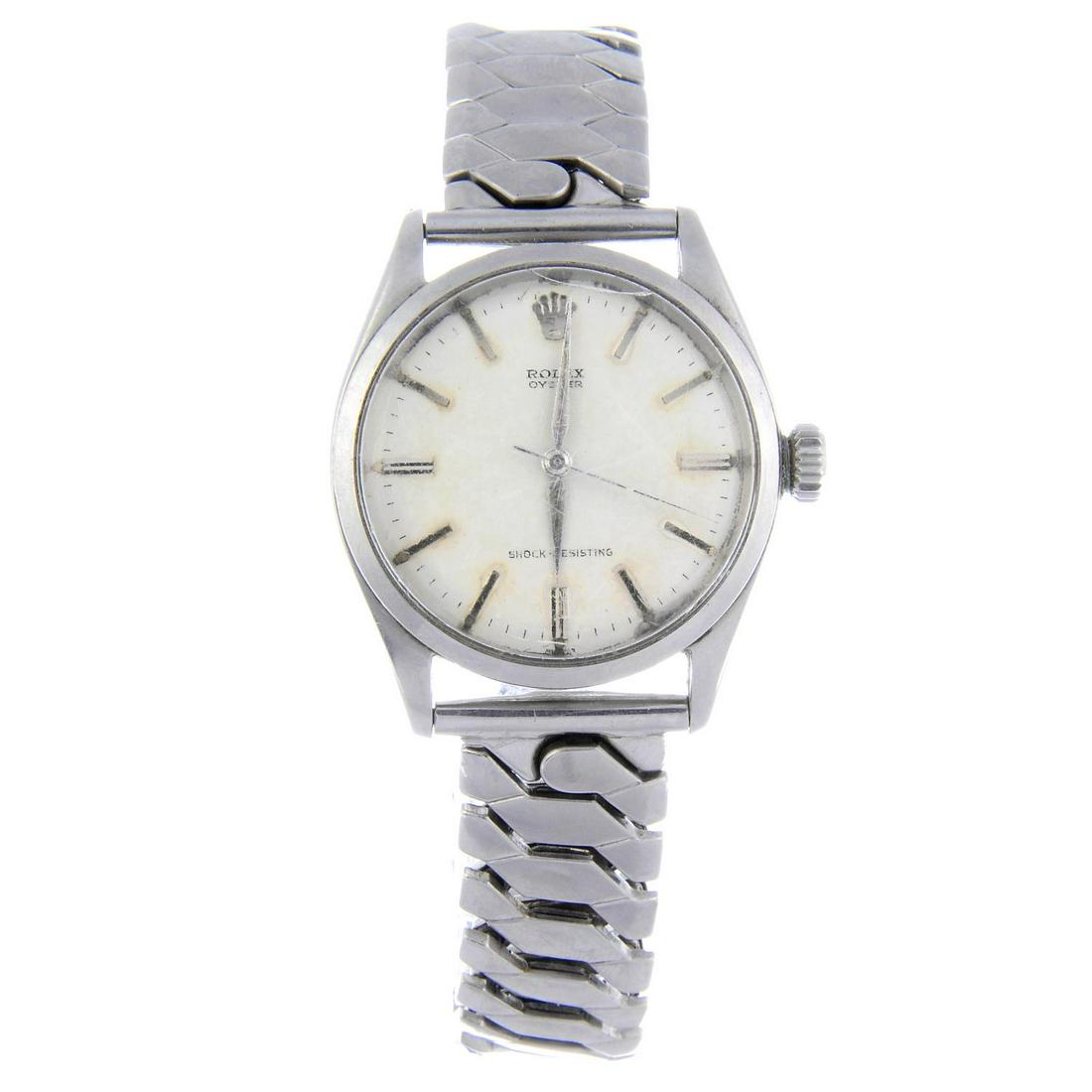 ROLEX - a gentleman's Oyster bracelet watch. Circa: ROLEX - a gentleman's Oyster bracelet watch. Circa 1956. Stainless steel case. Reference 6480, serial 210899. Signed manual wind calibre 1216. Silvered dial. Fitted to an unsigned stainless steel expa