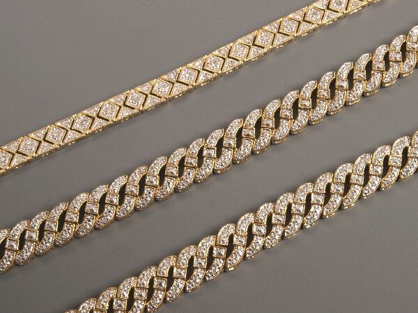 Two 9ct gold diamond set 'S' link bracelets (0.33c: Two 9ct gold diamond set 'S' link bracelets (0.33ct each bracelet) and two other 9ct gold diamond set bracelets (0.50ct each bracelet). (4)