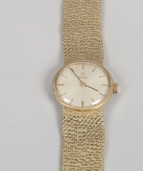 OMEGA - a lady's 1960's 9ct gold watch