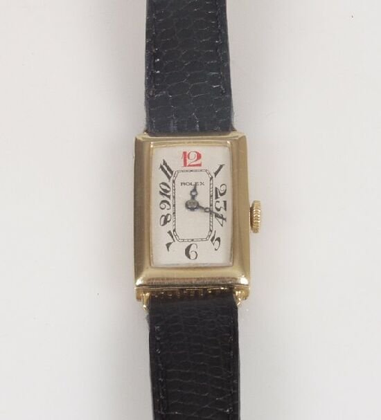 ROLEX - ladies 9ct 1930's wrist watch w: ROLEX - ladies 9ct 1930's wrist watch with rectangular silvered full figure dial, 15 jewel Rolex Prima movement on an associated black leather strap.