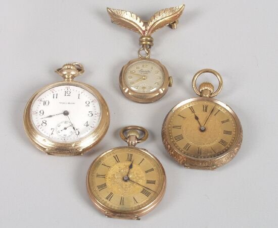 Four items comprising three lady's fob