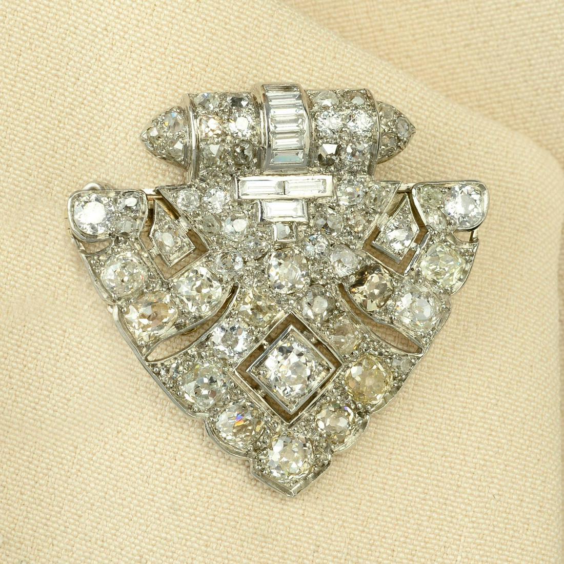 A mid 20th century platinum old-cut diamond brooch, (1 of 4)
