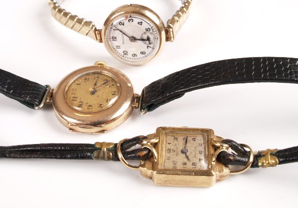 ROLEX - a ladies 1930's manual wind watch with a: ROLEX - a ladies 1930's manual wind watch with a circular face with white Arabic dial, import marks for Glasgow 1936 (crown deficient), together with an earlier example with presentation engraving to