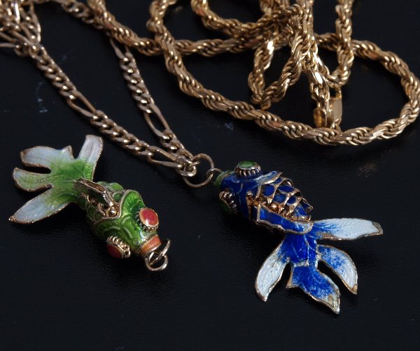 Two enameled fish design pendants, to include a gre: Two enameled fish design pendants, to include a green enameled and blue enamelled fish with a 9ct gold rope chain and a figaro chain.