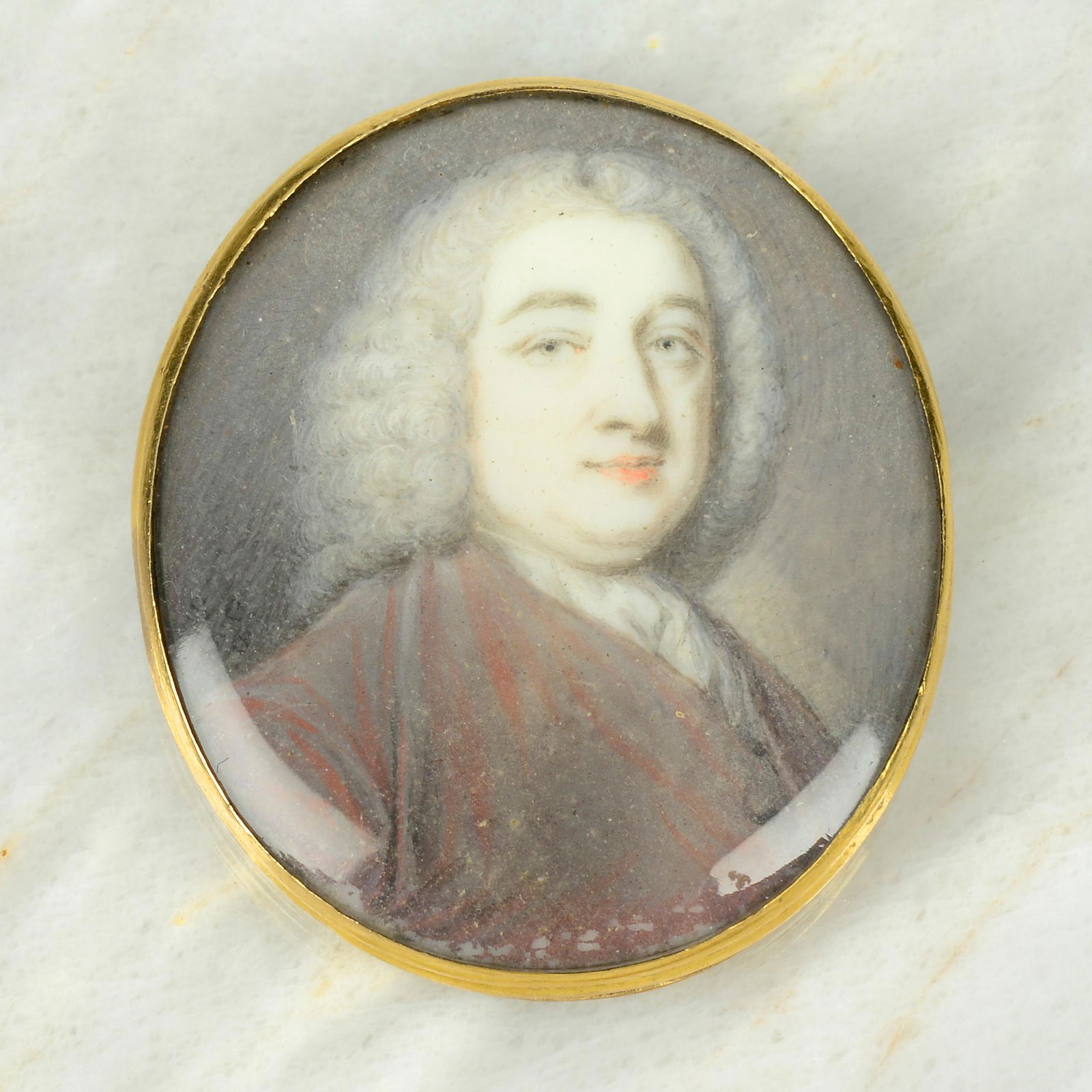 A Georgian gold portrait miniature clasp component, depicting Stephen Fox-Strangways, by Samuel: A Georgian gold portrait miniature clasp component, depicting Stephen Fox-Strangways, by Samuel Cotes.Length 3.5cms. 13.1gms.