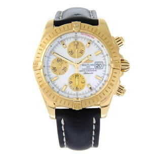 BREITLING - a Chronomat Evolution chronograph wrist watch. 18ct yellow gold case with calibrated: BREITLING - a Chronomat Evolution chronograph wrist watch. 18ct yellow gold case with calibrated bezel. Case width 42mm. Reference K13356, serial 2004759. Signed automatic calibre 7750 with quick date