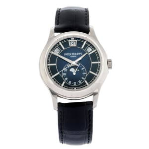 CURRENT MODEL: PATEK PHILIPPE - an Annual Calendar Moon Phase wrist watch. 18ct white gold case with