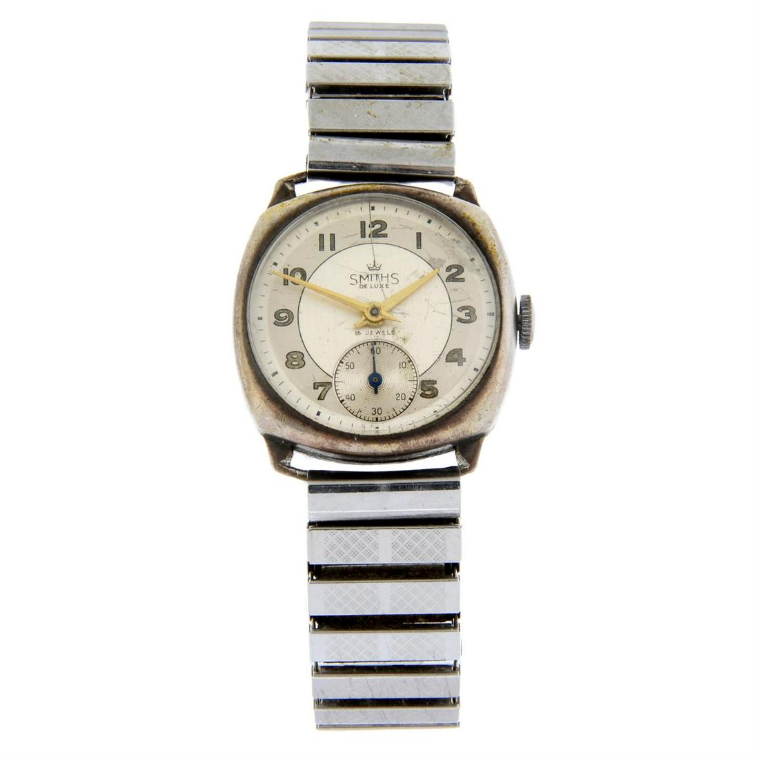 SMITHS - a silver bracelet watch, 29mm.: SMITHS - a gentleman's bracelet watch. Silver case with engraved case back, hallmarked London 1966. Case width 29mm. Numbered 6866. Unsigned manual wind movement. Two tone silvered dial. Fitted to an