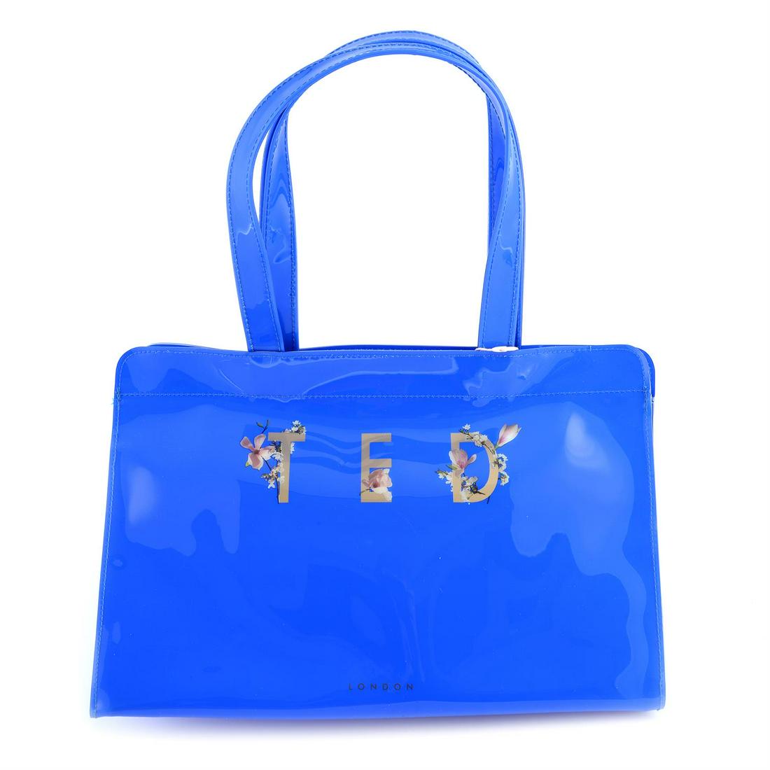 Three designer handbags to include DKNY, RADLEY and TED BAKER.: Three designer handbags to include DKNY, RADLEY and TED BAKER. DKNY-Light beige leather with gold-tone hardware, removable shoulder strap and four base corners, measures 23 by 19.5 by 11cm