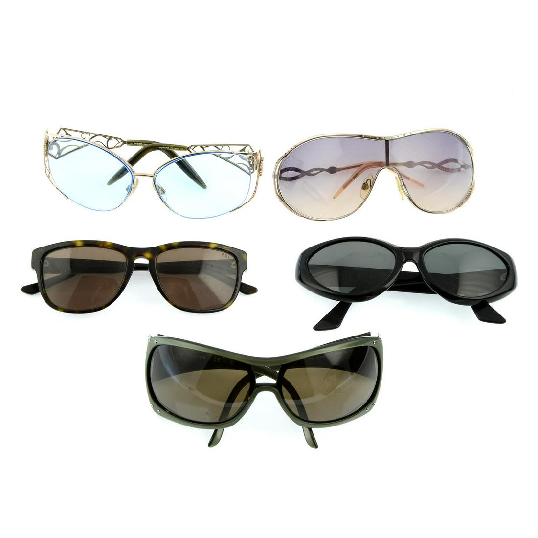 Five pairs of designer sunglasses.: Five pairs of designer sunglasses. To include Ralph Lauren, DKNY, Oliver and Roberto Cavalli and one pair of Roberto Cavalli prescription sunglasses. With four maker's cases and one maker's box. Condi