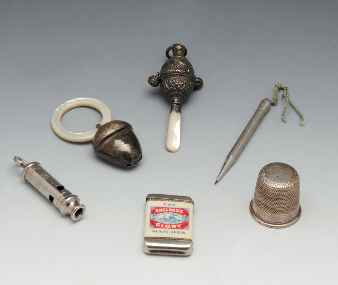 Victorian silver and mother of pearl rattle.: Late Victorian silver and mother of pearl child's rattle, hallmarked Birmingham 1900, maker probably Charles Wilkes; together with another silver and mother of pearl rattle, a white metal retractable 