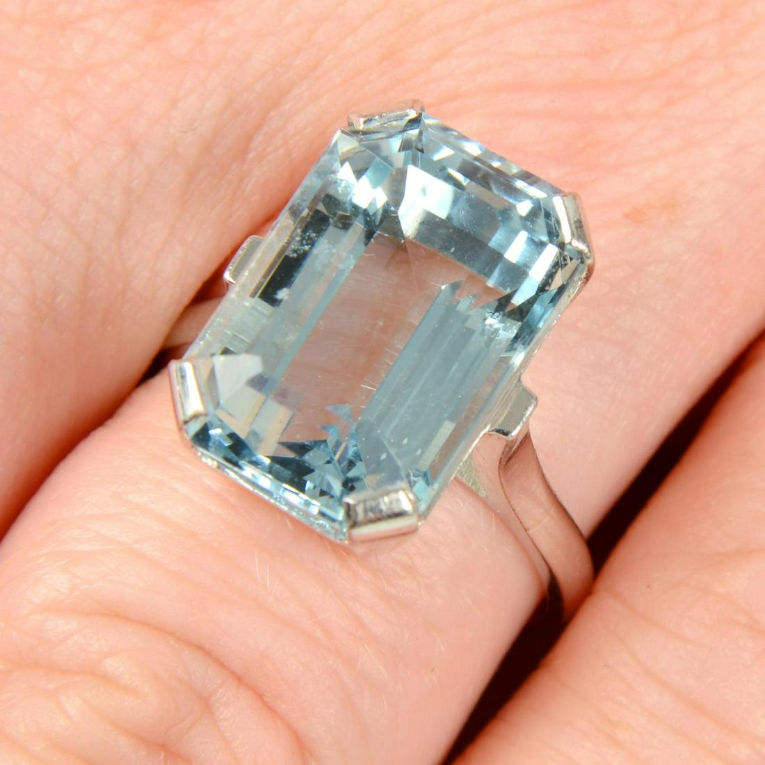 An 18ct gold aquamarine single-stone ring.Aquamarine calculated weight 9.05cts, based on estimated (1 of 5)