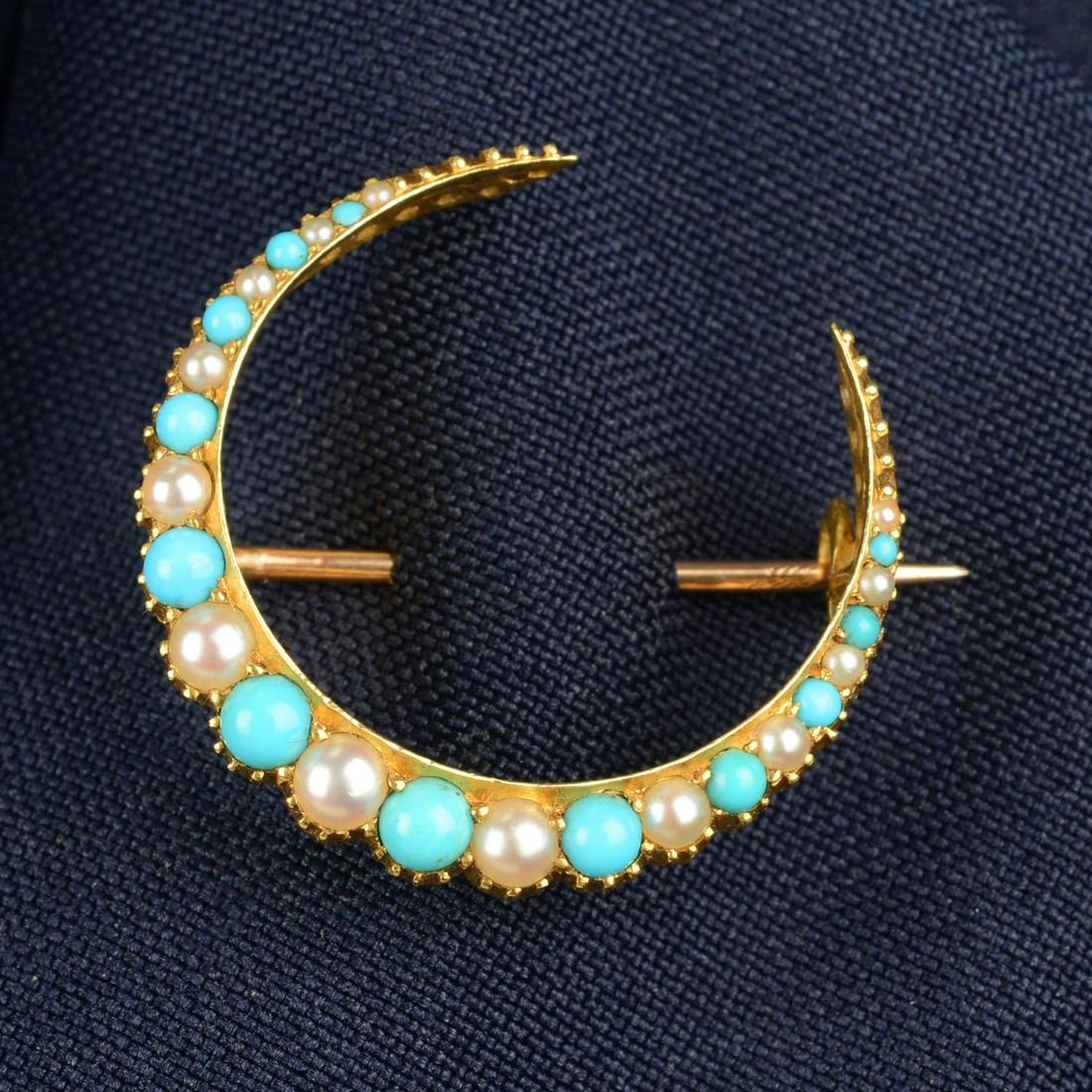 An early 20th century 15ct gold turquoise and split pearl crescent moon brooch.Engraved 15ct. (1 of 4)