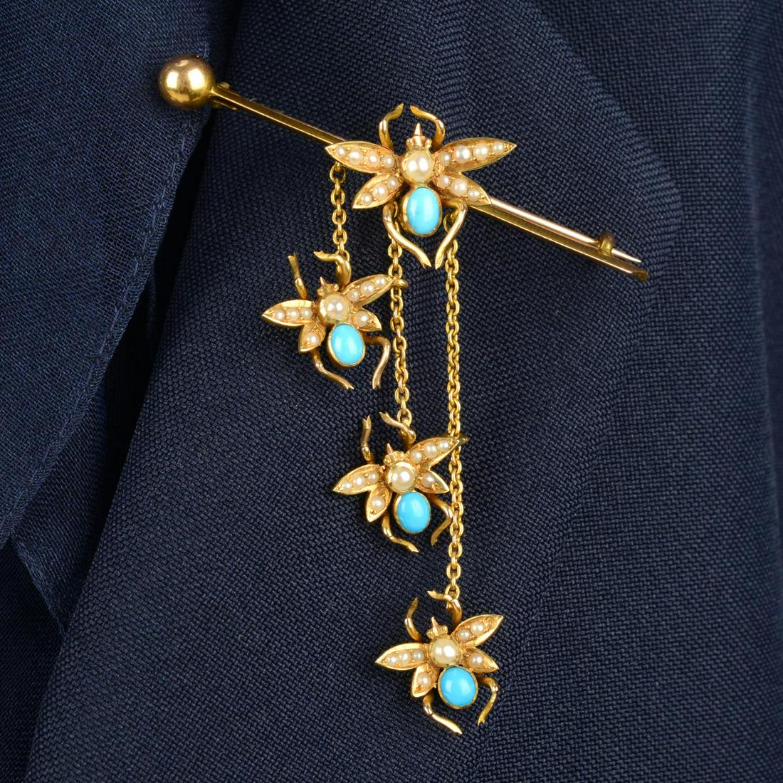 An early 20th century 15ct gold turquoise and split pearl fly brooch.Length of bar 5.1cms. Length of (1 of 4)