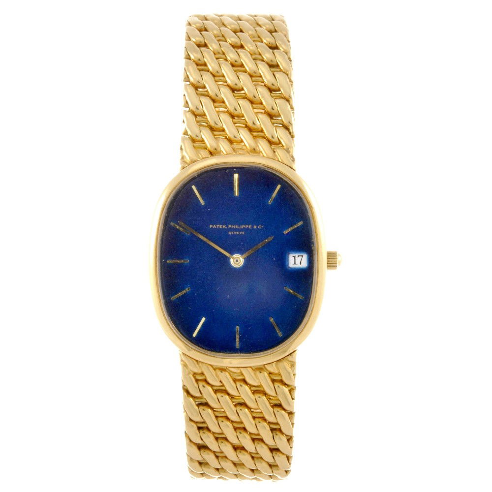 PATEK PHILIPPE - an 18k gold quartz gentleman's br: PATEK PHILIPPE - an 18k gold quartz gentleman's bracelet watch, the blue dial with hourly applied batons, date aperture to three o'clock, the oval case stamped 18k 750 with poincon, numbered 2873673 3