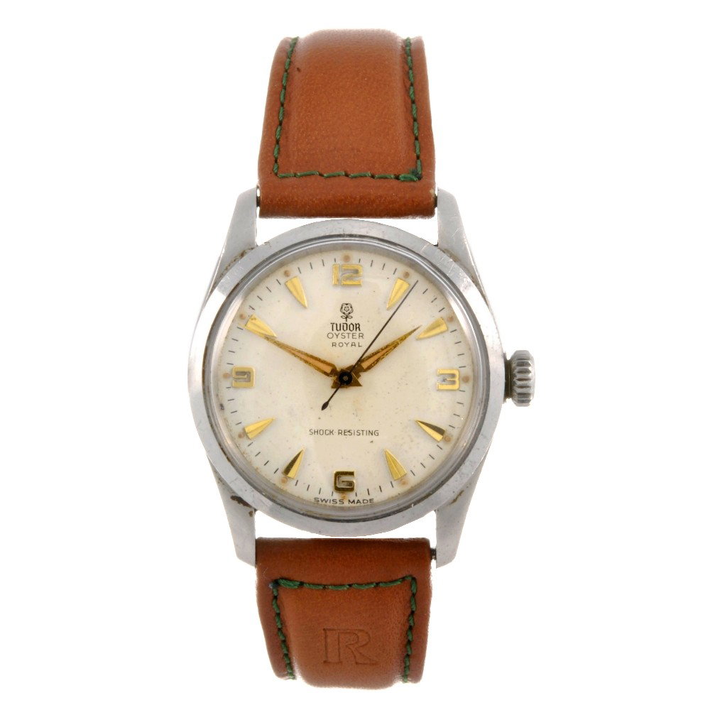 TUDOR - a stainless steel manual wind gentleman's : TUDOR - a stainless steel manual wind gentleman's Oyster Royal wrist watch, the silvered dial with hourly gilt chevron markers and quarterly Arabic numerals, bordered by a minute track, smooth fixed b