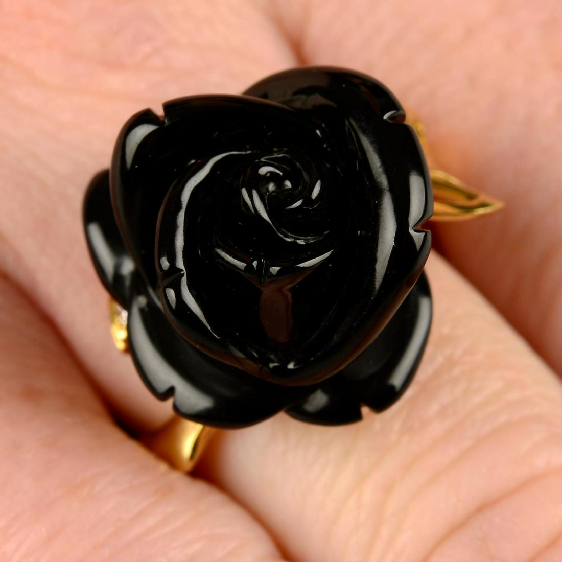 An onyx and diamond 'Pre Catelan' ring, by Dior.French assay marks, stamped Au750. Ring size O. (1 of 5)