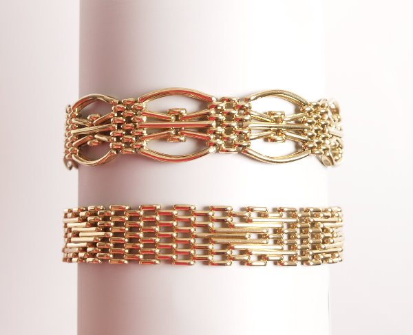 Two 9ct gold fancy link gate bracelets. Total wei: Two 9ct gold fancy link gate bracelets. Total weight - 38.84 grams.