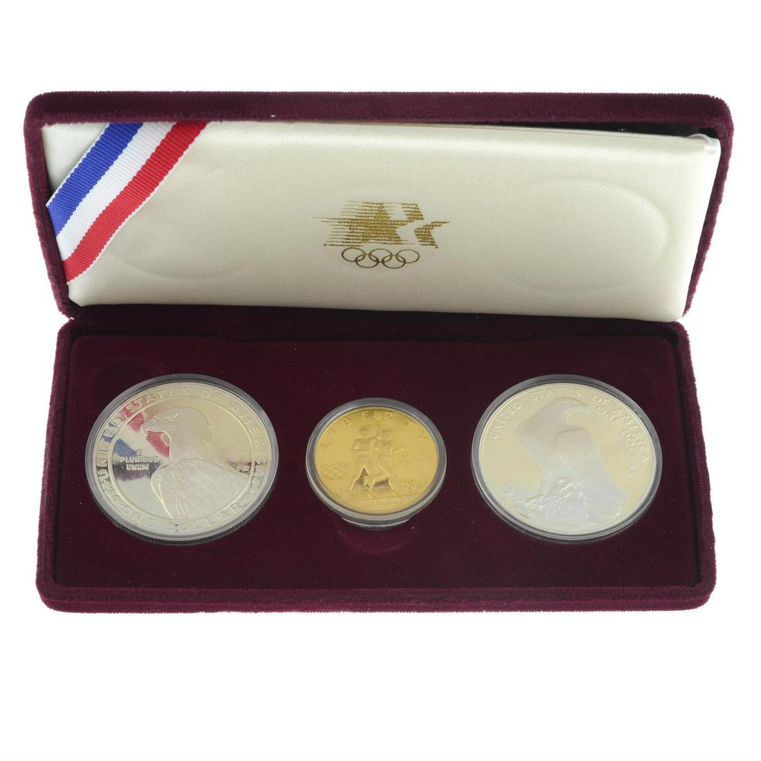 USA, Los Angeles Olympics 1984, commemorative proof coin set.: USA, Los Angeles Olympics 1984, commemorative proof coin set comprising gold 10-Dollars, .900 fine, 16.7g, silver Dollars (2), in fitted US Mint case of issue with certif