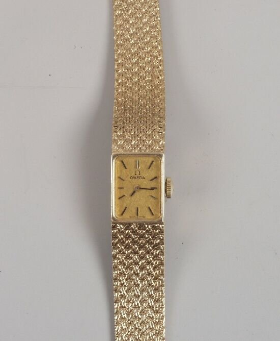 OMEGA - a lady's 9ct gold bracelet watc