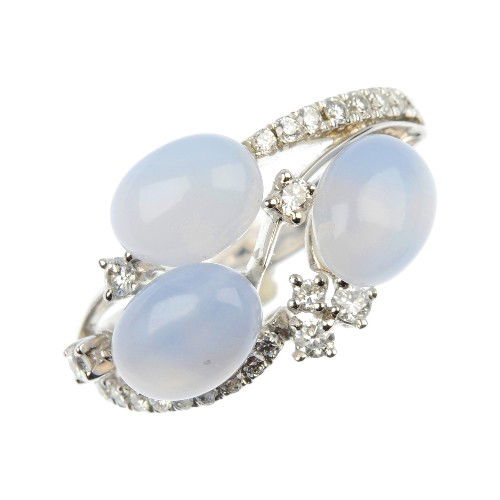 * CHIMENTO - a chalcedony and diamond cluster ring: * CHIMENTO - a chalcedony and diamond cluster ring. The oval chalcedony cabochons with brilliant-cut diamond detail to the similarly-cut diamond crossover shoulders and plain band. Stamped Chimento. E