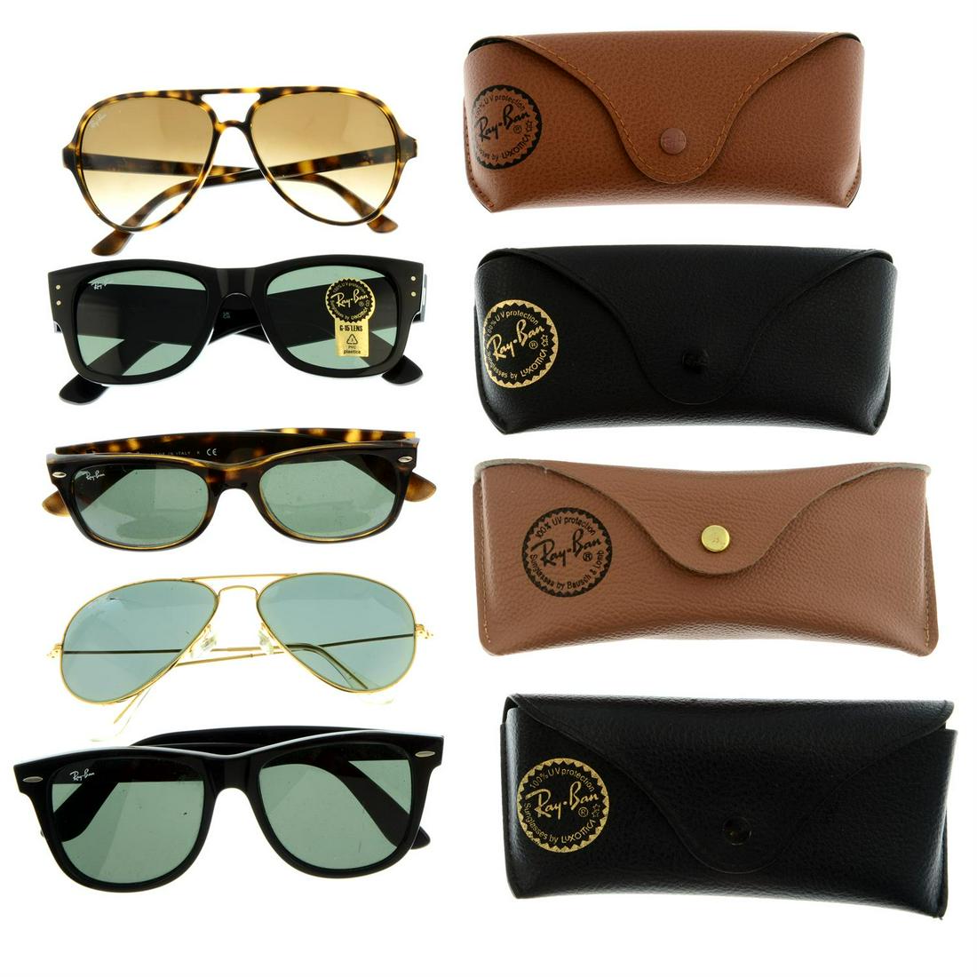 RAY BAN - five pairs of sunglasses.: RAY BAN - five pairs of sunglasses. With four maker's cases and one maker's box. Condition Report: Glasses are in overall good condition. However, there are surface scratches to the lenses and the fra
