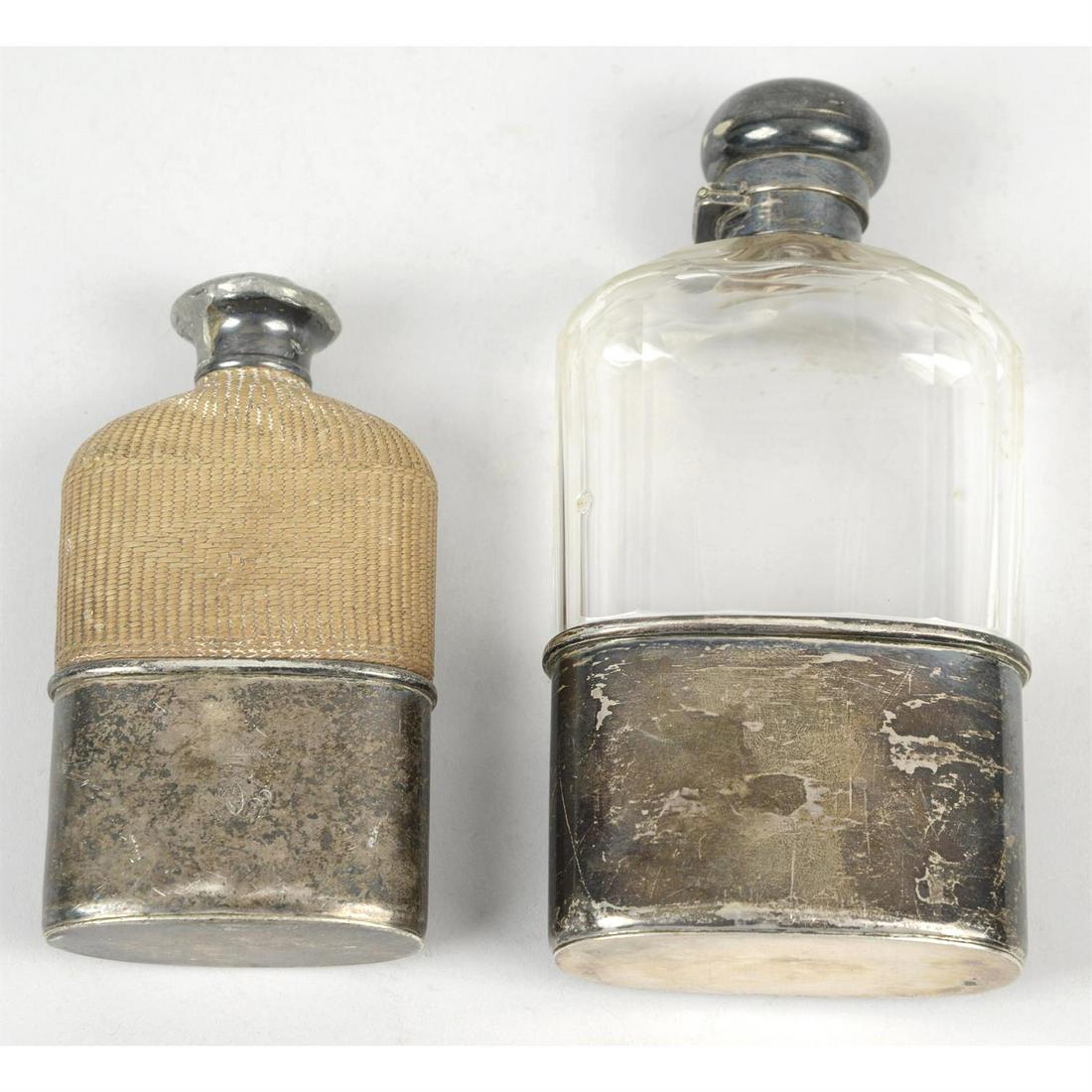 Two Victorian silver mounted & glass hip flasks. (2).: Two Victorian silver mounted and glass hip flasks, hallmarked London 1853 and London 1890. Height of tallest example 6" (15.25cm). (2). Condition Report: