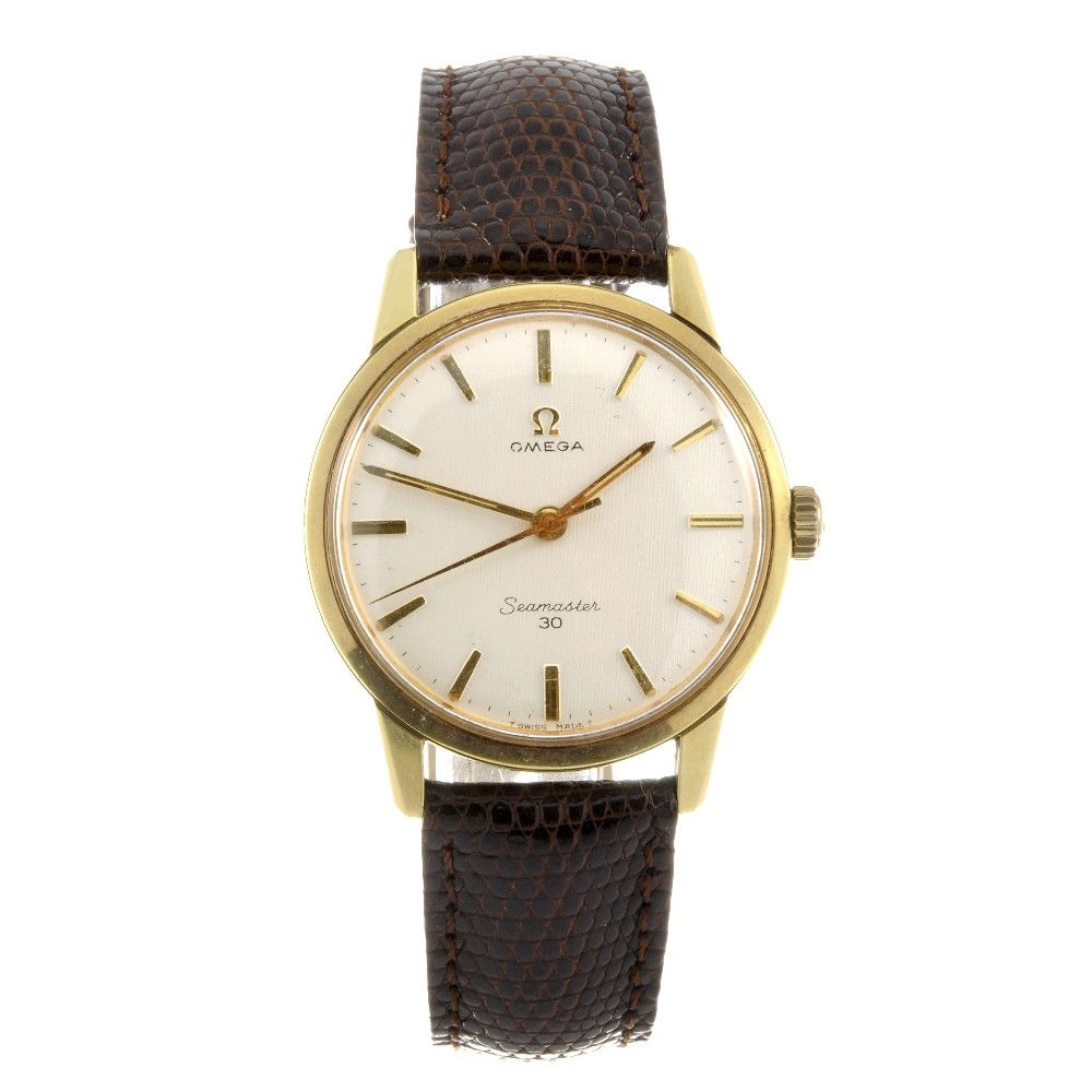 OMEGA - a gold plated manual wind gentleman's Seam: OMEGA - a gold plated manual wind gentleman's Seamaster 30 wrist watch, the silvered dial with hourly applied batons, bordered by a minute track, circular shaped case with stainless steel back, fitted