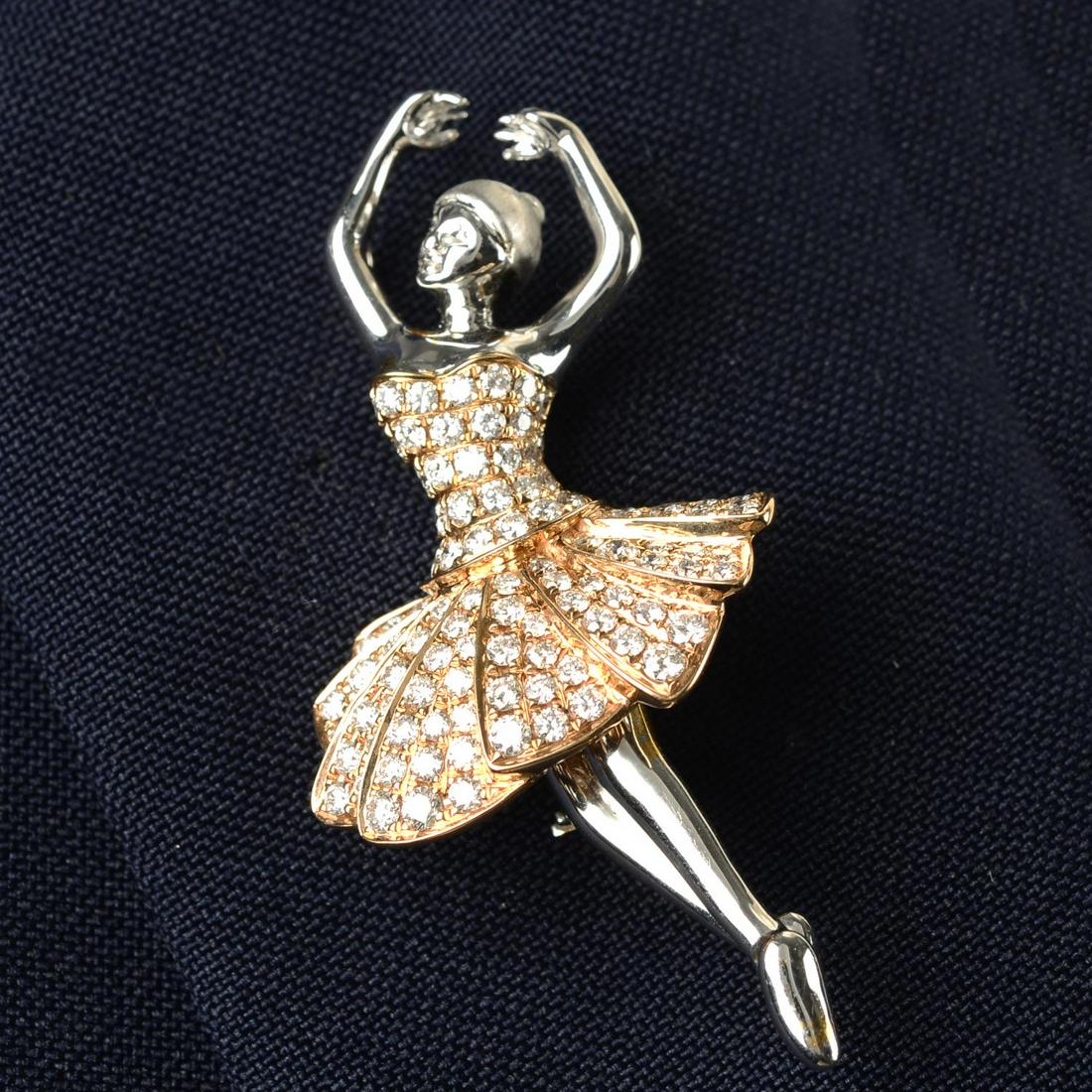 A brilliant-cut diamond bi-colour ballerina brooch.May be worn as a pendant.Total diamond weight (1 of 4)